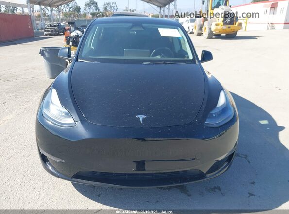 7SAYGDEEXPF855734 2023 TESLA MODEL Y Black Rear interior view