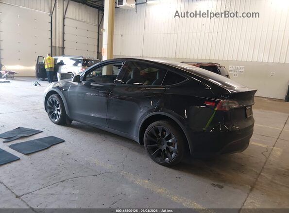 7SAYGDEEXPF885896 2023 TESLA MODEL Y Black Rear left