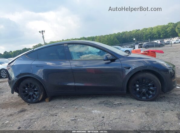 7SAYGDEEXRA231528 2024 TESLA MODEL Y Gray უკანა სალონის ხედი