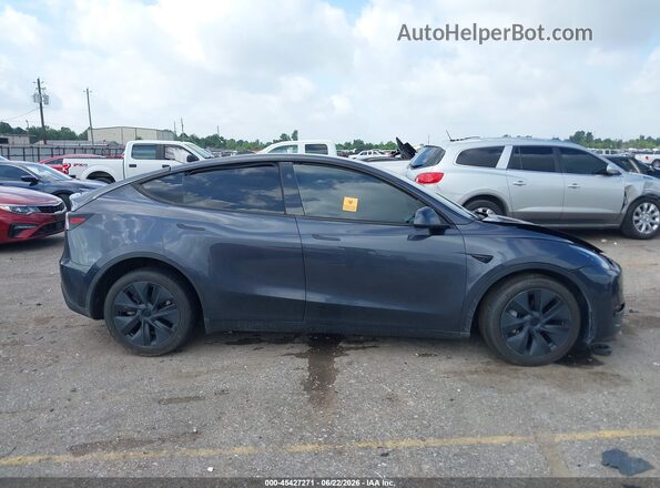 7SAYGDEEXRA308804 2024 TESLA MODEL Y Gray Widok wnętrza z tyłu