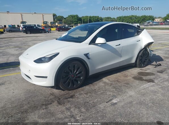 7SAYGDEF0NF323690 2022 TESLA MODEL Y White წინა მარცხენა ხედი სამი მეოთხედიდან