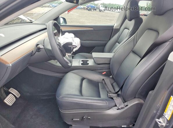 7SAYGDEF0PF711991 2023 TESLA MODEL Gray Front interior view