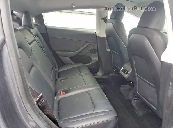 7SAYGDEF0PF711991 2023 TESLA MODEL Gray Rear seats view