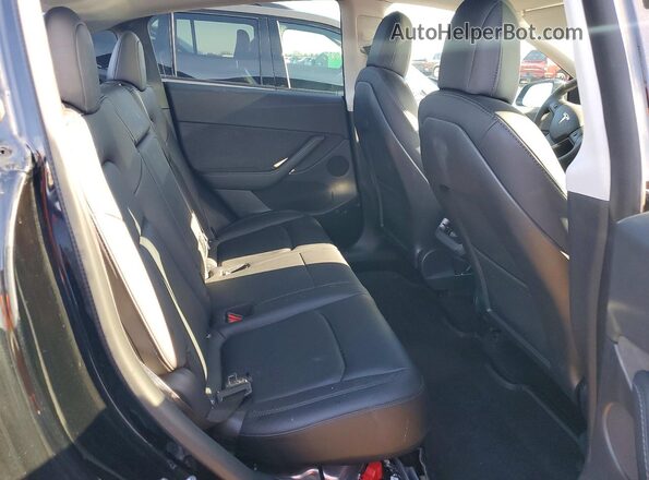 7SAYGDEF1NF326906 2022 TESLA MODEL Black Rear seats view