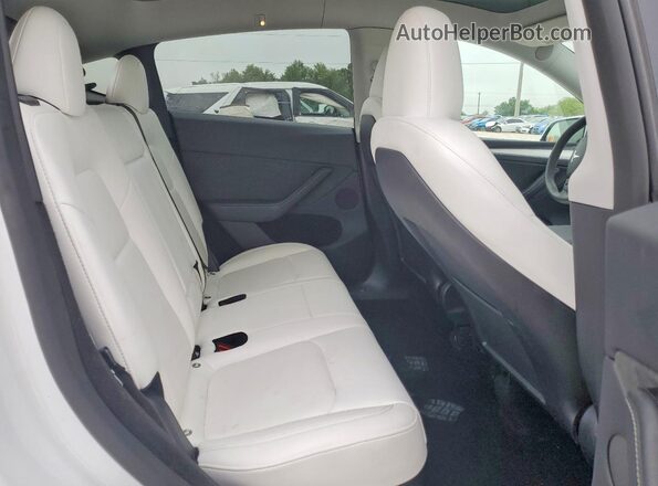 7SAYGDEF1RA275099 2024 TESLA MODEL White Vista de los asientos traseros