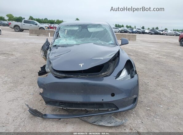 7SAYGDEF4NF540644 2022 TESLA MODEL Y Gray Vista interior trasera