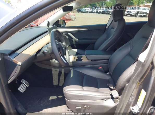 7SAYGDEF4PF859710 2023 TESLA MODEL Y Gray Front interior view