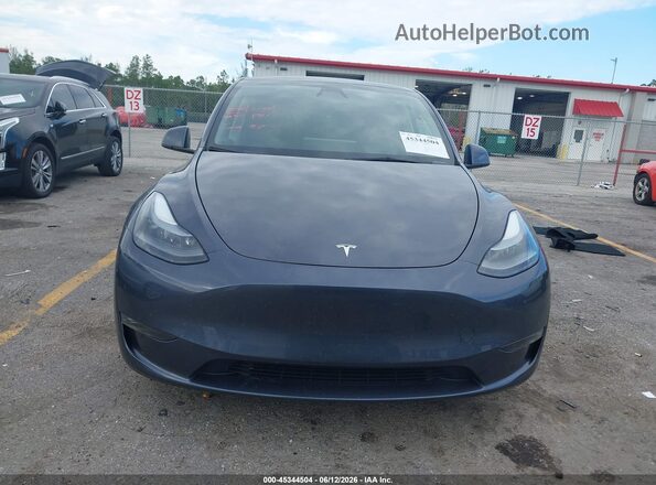 7SAYGDEF4PF861702 2023 TESLA MODEL Y Gray უკანა ხედი