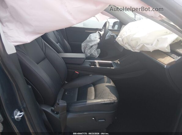 7SAYGDEF5PF880338 2023 TESLA MODEL Y Gray Widok wnętrza z przodu
