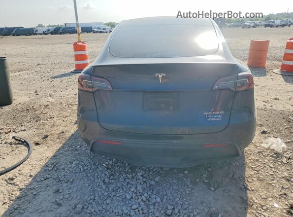 7SAYGDEF5RA308377 2024 TESLA MODEL Charcoal Rear view