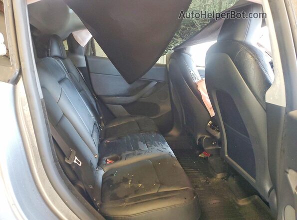 7SAYGDEF5SA357262 2025 TESLA MODEL Gray Rear interior view