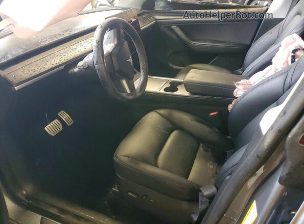 7SAYGDEF5SA357262 2025 TESLA MODEL Gray Front interior view
