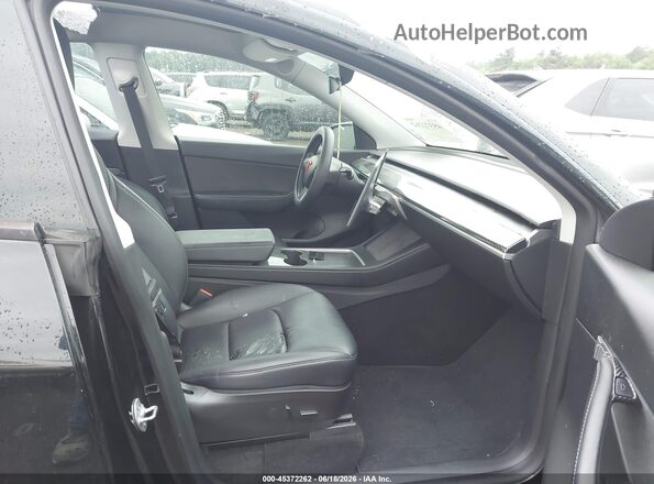 7SAYGDEF6NF397938 2022 TESLA MODEL Y Черный Вид салона спереди