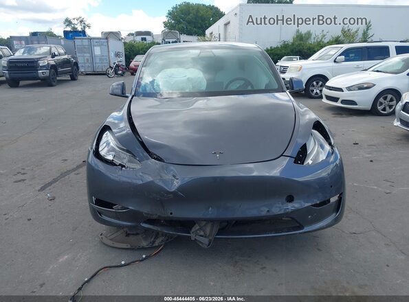 7SAYGDEF6NF448032 2022 TESLA MODEL Y Серый Вид панели приборов