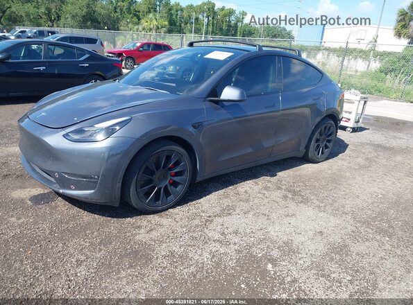 7SAYGDEF6PF839250 2023 TESLA MODEL Y Gray Առջևի ձախ երեք քառորդ տեսարան