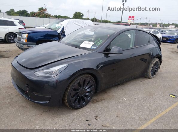 7SAYGDEF6RF039485 2024 TESLA MODEL Y Black Przód lewy
