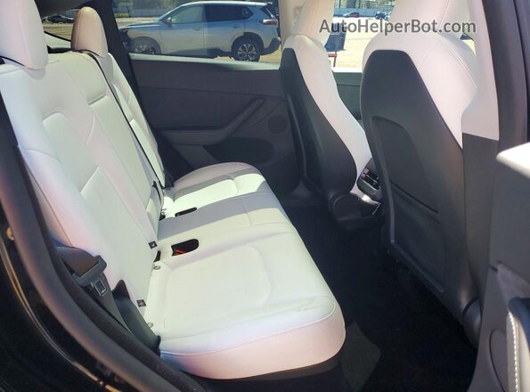 7SAYGDEF6SA378086 2025 TESLA MODEL White უკანა სავარძლების ხედი