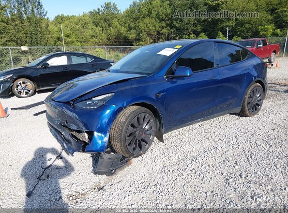 7SAYGDEF7NF310239 2022 TESLA MODEL Y Blue წინა მარცხენა ხედი სამი მეოთხედიდან
