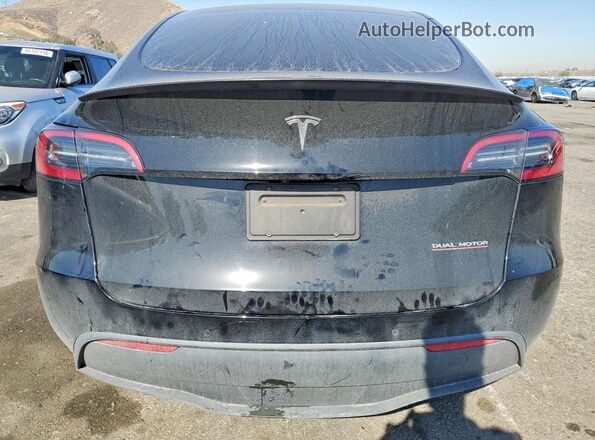 7SAYGDEF7NF407781 2022 TESLA MODEL Black Հետևի տեսք