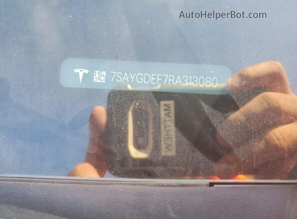 7SAYGDEF7RA313080 2024 TESLA MODEL Red VIN კოდის სტიკერის ხედი