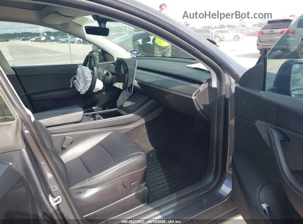 7SAYGDEF8NF494767 2022 TESLA MODEL Y Gray Вид салону спереду