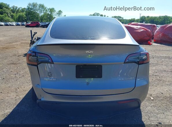 7SAYGDEF8RA310219 2024 TESLA MODEL Y Серебряный 