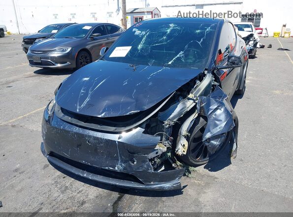 7SAYGDEF8RF106717 2024 TESLA MODEL Y Серый Вид спереди