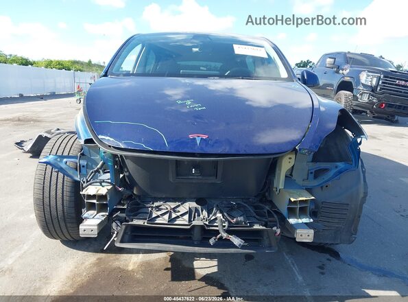 7SAYGDEF9NF565054 2022 TESLA MODEL Y Blue Widok wnętrza z tyłu