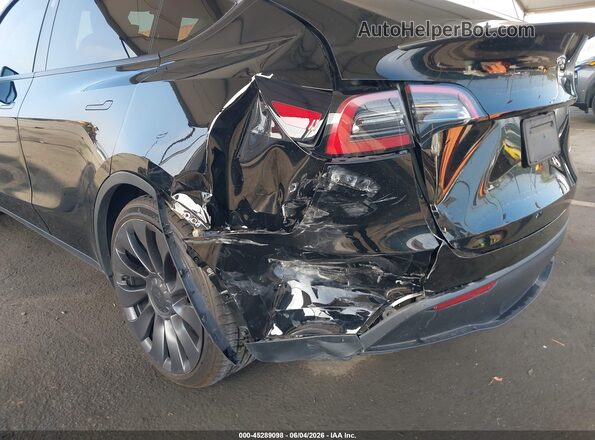 7SAYGDEF9PF925202 2023 TESLA MODEL Y Black Front view