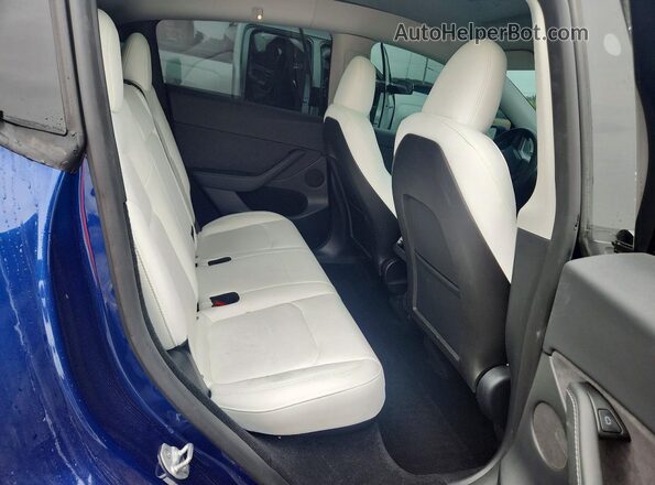 7SAYGDEF9RF048729 2024 TESLA MODEL Синий Вид задней части салона