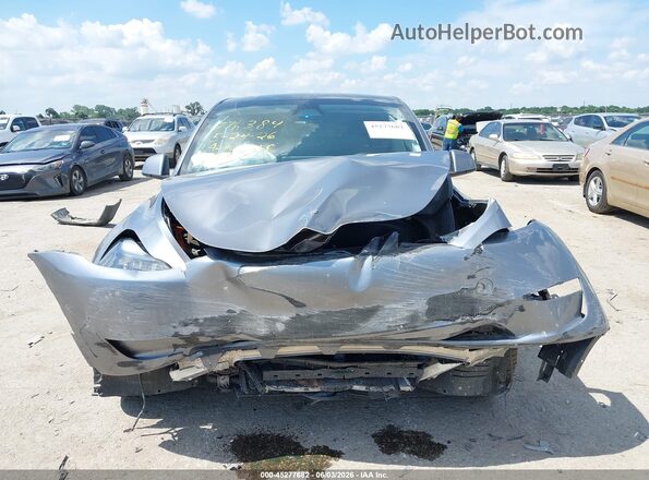 7SAYGDEFXRA327636 2024 TESLA MODEL Y Gray Առջևի վահանակի տեսք