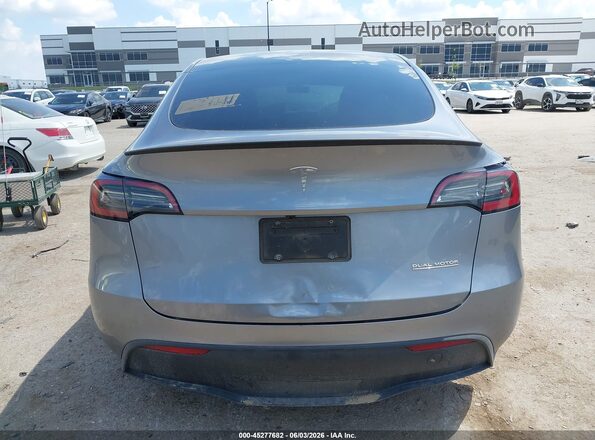 7SAYGDEFXRA327636 2024 TESLA MODEL Y Gray 