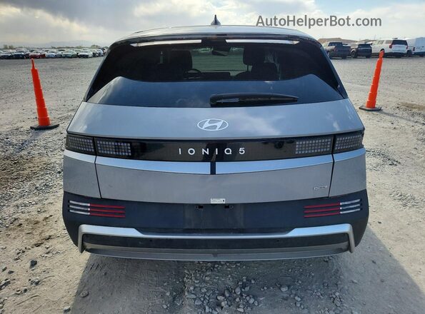 7YAKNDDC3TY041775 2026 HYUNDAI IONIQ Gray Вид ззаду