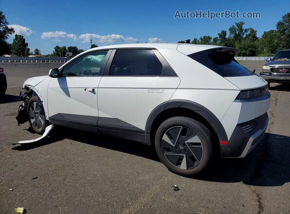 7YAKNDDC6TY041592 2026 HYUNDAI IONIQ White Հետևի ձախ
