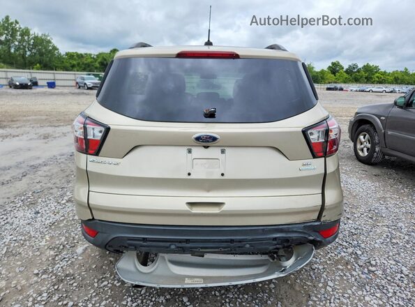 1FMCU0GD0JUB88809 2018 FORD ESCAPE Gold Front interior view