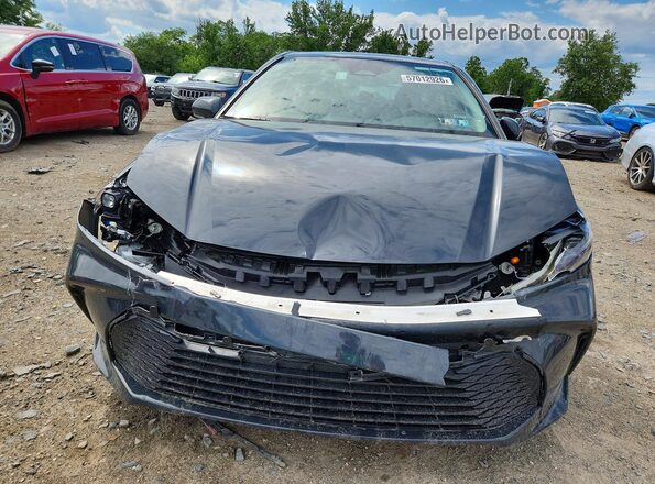 4T1DAACKXSU018515 2025 TOYOTA CAMRY Gray Widok z tyłu