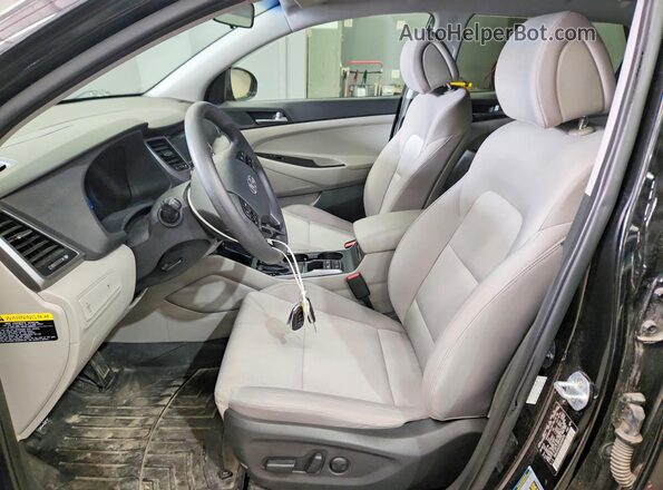 KM8J3CA22GU043878 2016 HYUNDAI TUCSON Черный Вид панели приборов