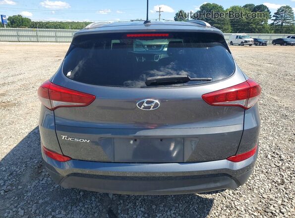 KM8J33A4XGU114519 2016 HYUNDAI TUCSON Gray Սալոնի դիմացի տեսք