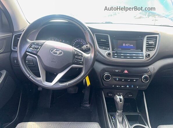 KM8J3CA42GU083136 2016 HYUNDAI TUCSON Blue Vista de los asientos traseros