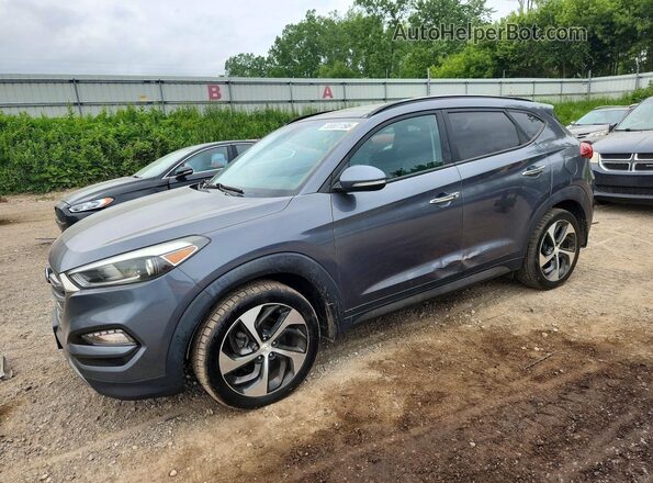 KM8J3CA23GU044036 2016 HYUNDAI TUCSON Gray უკანა მარცხენა