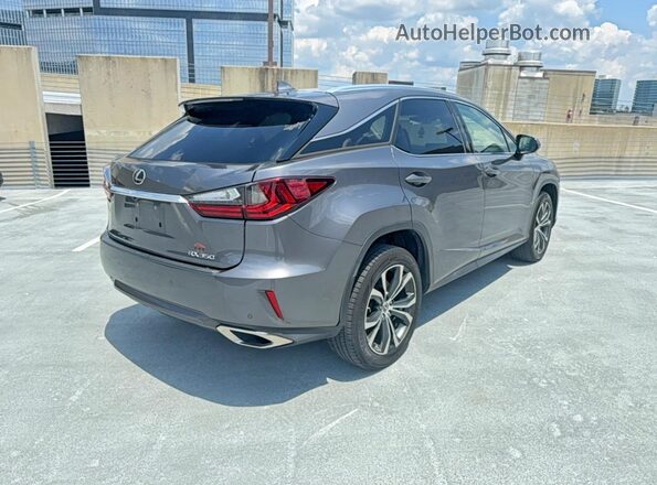 2T2ZZMCAXKC132082 2019 LEXUS RX Gray Вид спереду