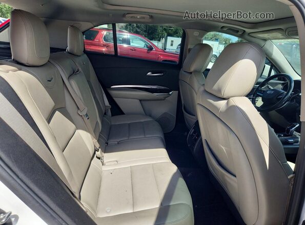 1GYAZAR48PF104176 2023 CADILLAC XT4 White 