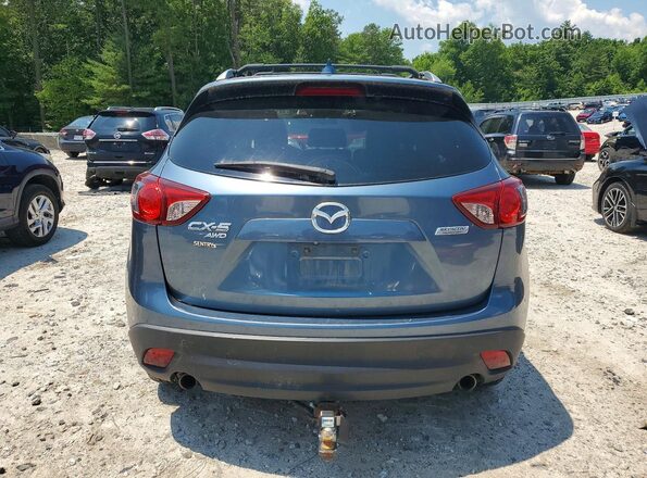 JM3KE4DY6G0670963 2016 MAZDA CX-5 Blue Front interior view