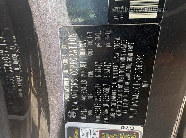 KNDMB5C17J6356389 2018 KIA SEDONA Blue Widok wnętrza z tyłu