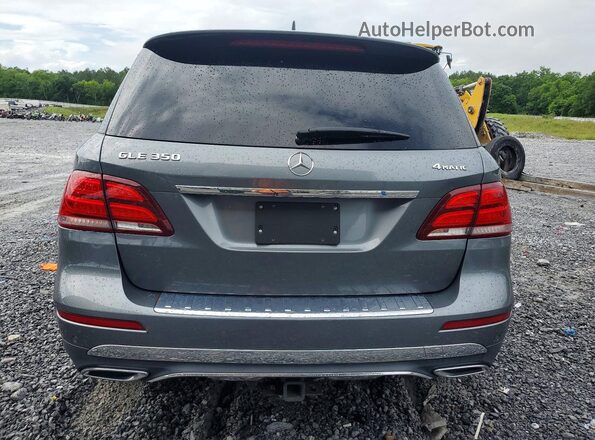 4JGDA5HB4JB183339 2018 MERCEDES-BENZ GLE-CLASS Gray Vista interior delantera