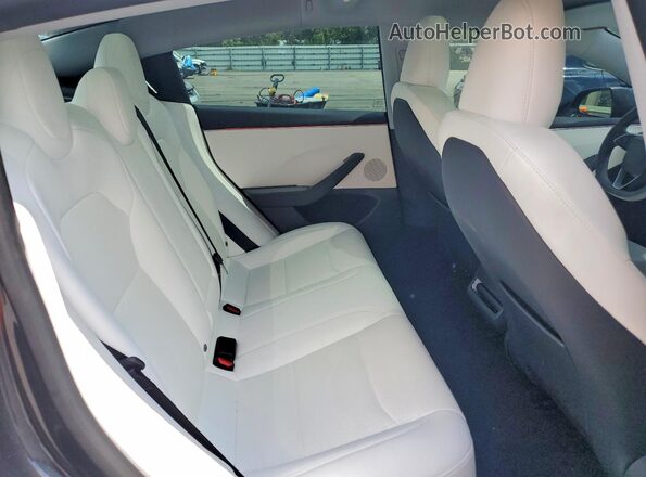 5YJ3E1EA6SF998777 2025 TESLA MODEL 3 Gray Սալոնի հետևի տեսք