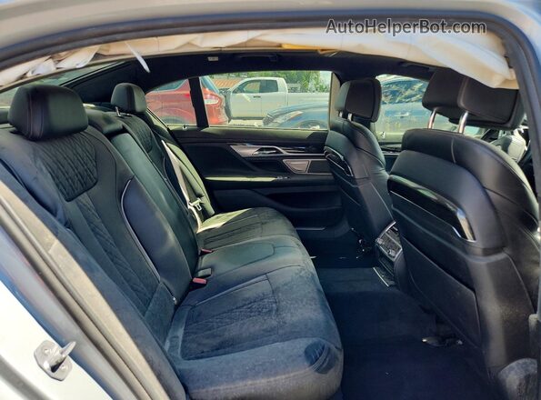 WBA7F2C55GG419198 2016 BMW 7 SERIES Silver Вид задньої частини салону