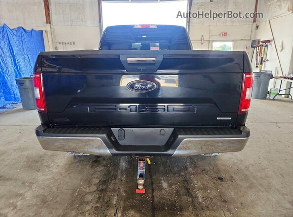 1FTFW1EGXJFB91624 2018 FORD F150 Black Front interior view
