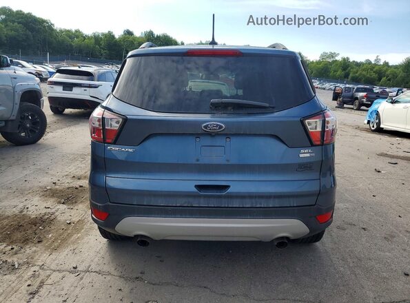 1FMCU9HD9JUA93796 2018 FORD ESCAPE Blue წინა სალონის ხედი