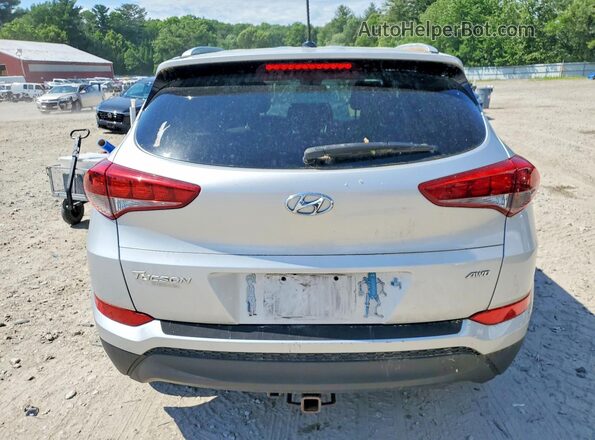 KM8J3CA46GU247939 2016 HYUNDAI TUCSON Silver Вид салону спереду